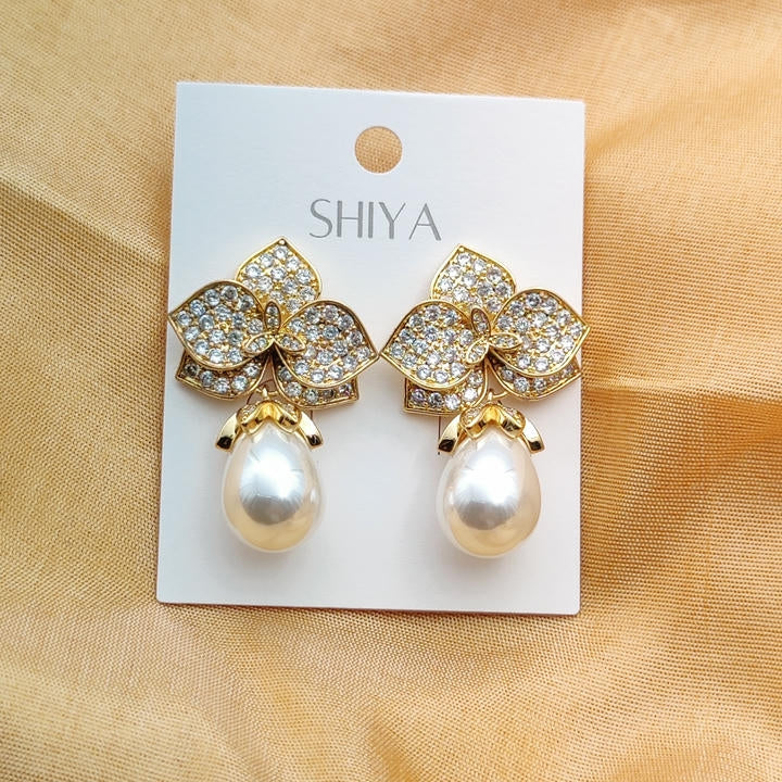 Elegant Drop Pearl And Diamond Leaf Earring