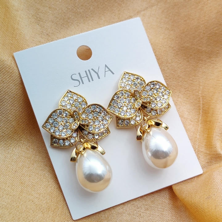 Elegant Drop Pearl And Diamond Leaf Earring