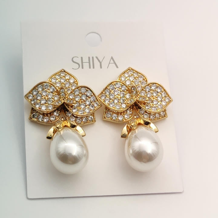 Elegant Drop Pearl And Diamond Leaf Earring
