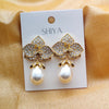 Elegant Drop Pearl And Diamond Leaf Earring