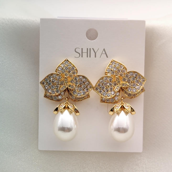 Elegant Drop Pearl And Diamond Leaf Earring