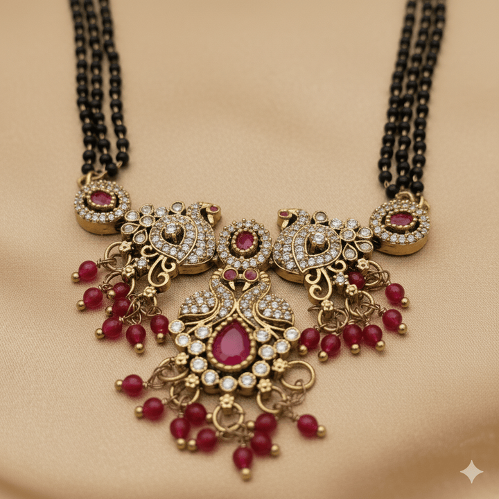 Elegant Gold Plated Ad Stone Peacock Mangalsutra With Earrings